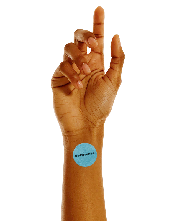 Hand with a Sleep Patch on the wrist against a white background